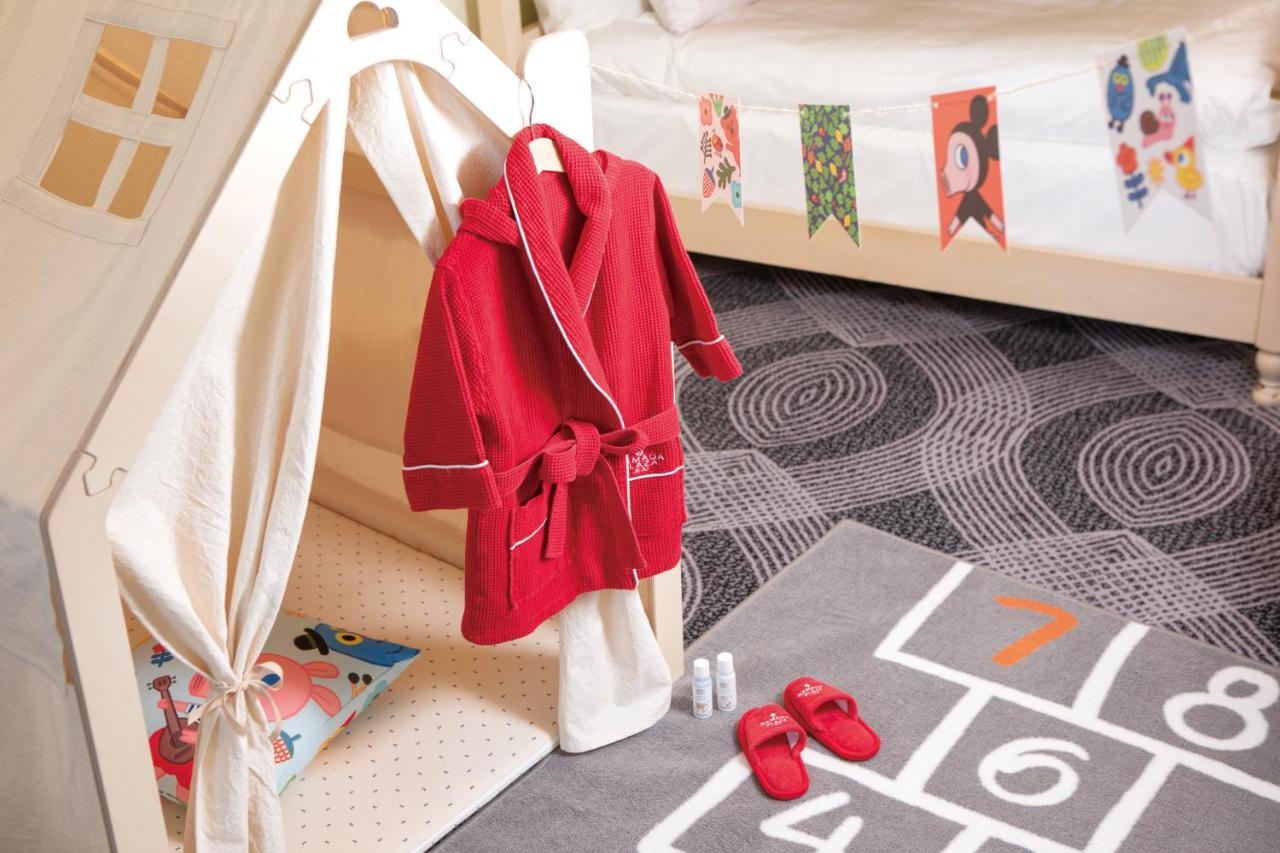 מלון Ramada Plaza By Wyndham Jeju Ocean Front מראה חיצוני תמונה A bathrobe